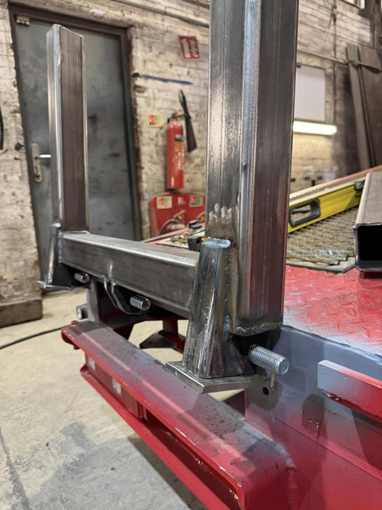 Trailerman. Angled box section stops with locating feet